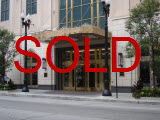click to read about the drop in condos for sale at 21 E Huron